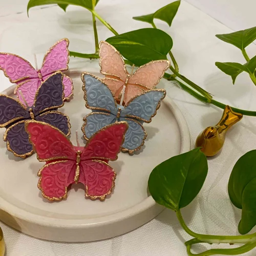 شمع دکوری پروانه لب طلایی