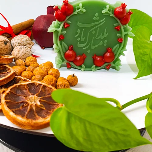 شمع کتیبه شب یلدا مبارک رنگ شده سبز