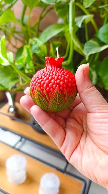 شمع انار و برگ جدید